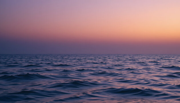 Twilight seascape with deep violet and warm orange sky gradient