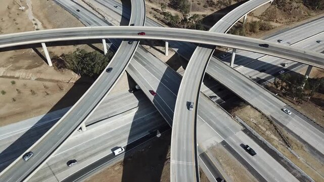 Los Angeles freeway traffic is a common phenomenon that impacts millions of commuters daily. The intricate system of highways and overpasses create a beautiful pattern.