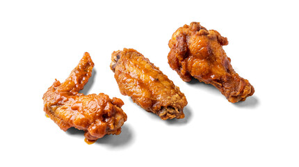 three buffalo chicken wings coated in a rich orange sauce on a clean transparent background, studio shot. © Piotr