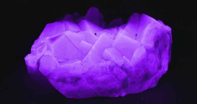 Fluorite Crystal Glowing under UV Light