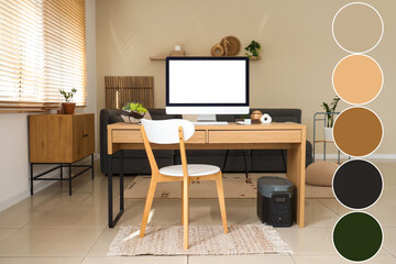 Naklejka premium Modern table with computer in interior of living room
