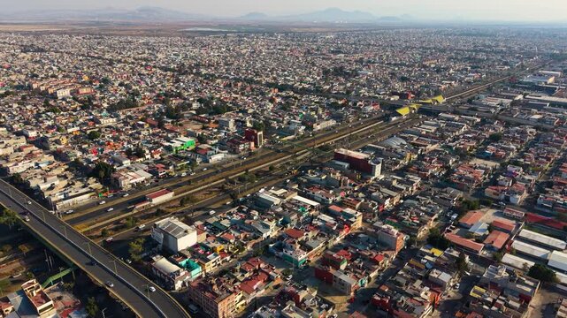 Golden hour aerial over Ecatepec showing dense residential landscape