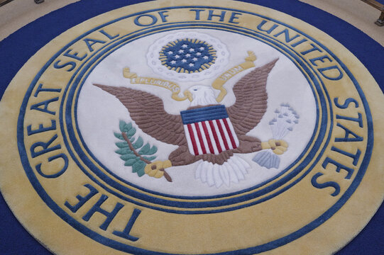 The Great Seal of the United States presidential seal on a government rug