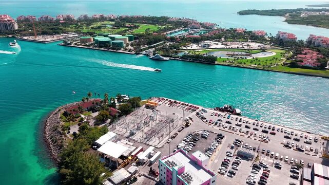 Fisher island and port. Panorama view of Fisher island and port Miami. Port of Miami. Cargo shipping container in Miami, aerial view. Aerial Miami port with cargo container, 4k