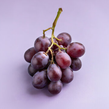 A cluster of ripe, plump grapes, a symbol of nature's bounty and culinary delight