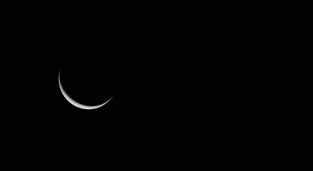 Crescent Moon in Dark Background Ramadan copy space