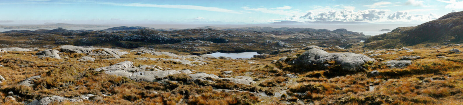Isle of Harris, Outer Hebrides, Scotland. Panorama to E. from Shiant Isles viewpoint at Grose-Cleit south of Tarbert. Trotternish Skye central horizon