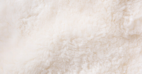 white plush fabric texture background , background pattern of soft warm material © zhikun sun
