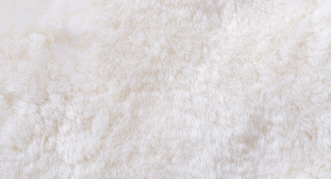 white plush fabric texture background , background pattern of soft warm material