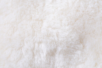 white plush fabric texture background , background pattern of soft warm material © zhikun sun