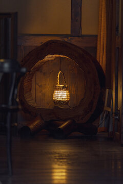 Traditional Japanese lantern glowing with warm light in the dark