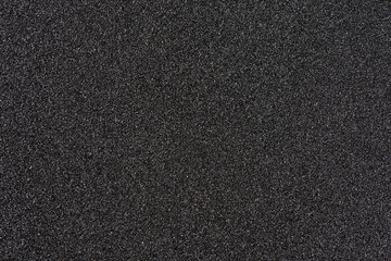 Fototapeta premium abrasive paper. black sandpaper texture background. 