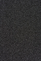 Fototapeta premium abrasive paper. black sandpaper texture background. 