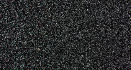 Fototapeta premium abrasive paper. black sandpaper texture background. 
