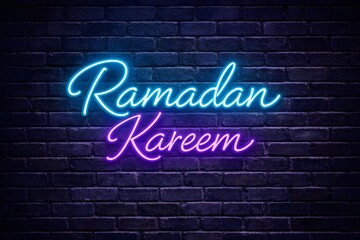 Obraz premium Ramadan kareem neon sign on brick wall background islamic greeting