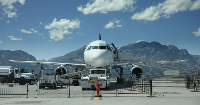 Passenger Jet Time Lapse at Jackson Hole Airport with Mountain Backdrop