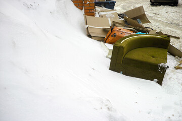 discarded furniture on the snow