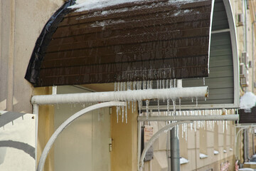 icicles hanging on the canopy