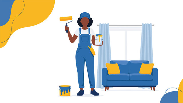 Professional female house painter in overalls holding a roller and paint bucket standing in a living room interior.