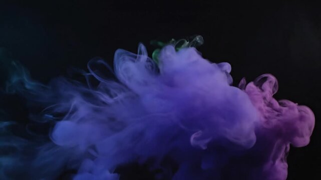 Vibrant purple and blue smoke swirling against a dark background with a mix of colorful fumes.