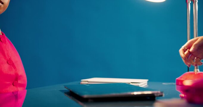 Business people, meeting and studio with handshake for hiring or recruiting on a blue background. Closeup, employees or colleagues shaking hands with tablet for b2b, partnership or onboarding deal