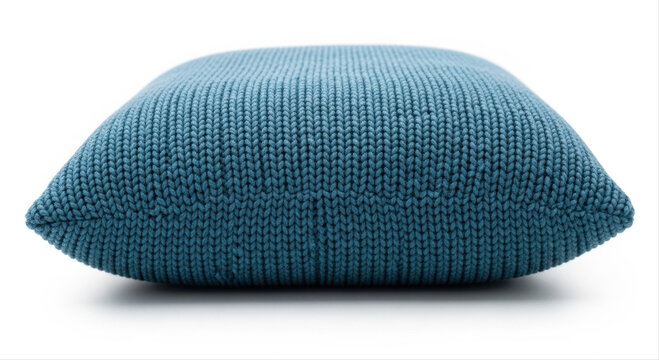 Blue memory foam pillow with textured knit cover isolated on white background