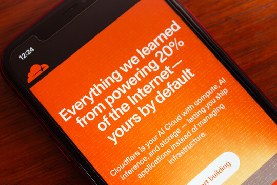 Quito, ECUADOR - Feb 18 2026 : Close-up smartphone displaying Cloudflare Workers landing page, highlighting serverless edge computing and developer platform for web apps.