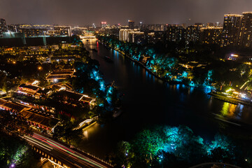 Fototapeta premium Hangzhou Grand Canal Night Cityscape with Illuminated Architecture