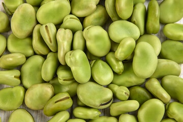 Fresh Green Fava Beans on Wooden Surface