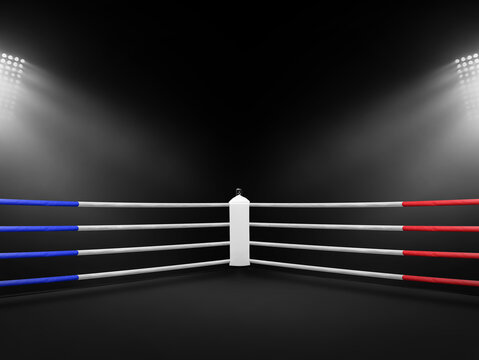 Close up empty white corner in boxing ring in stadium, The background is a blurred image with spotlights shining from the left and right sides