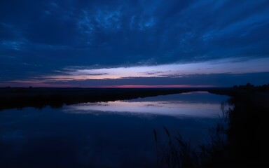 Fototapeta premium Deep Blue Dusk Over Reflecting Water