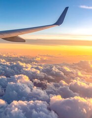 Obraz premium A serene view from an airplane window showing clouds and sunset