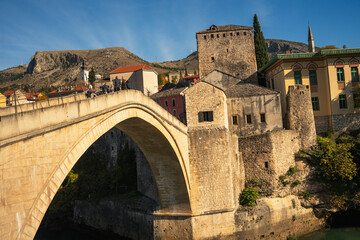 Obraz premium Historic Stari Most Old Bridge in Mostar over Neretva river, UNESCO World Heritage site in Bosnia and Herzegovina, Ottoman stone architecture