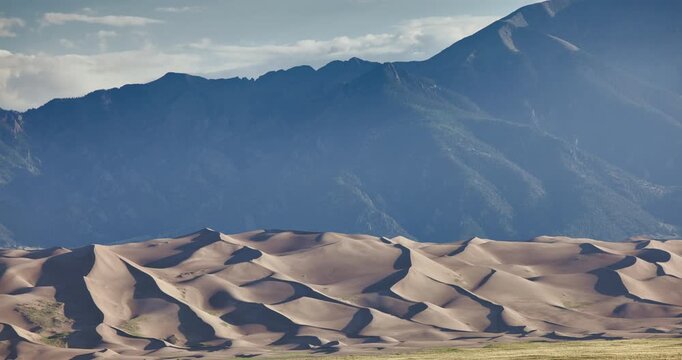 Telephoto Time Lapse Pan of Great Sand Dunes with Sangre de Cristo Mountains Colorado short