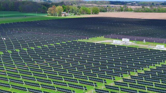 Blue Elk Solar Field in Adrian, Michigan generating sustainable energy in aerial view