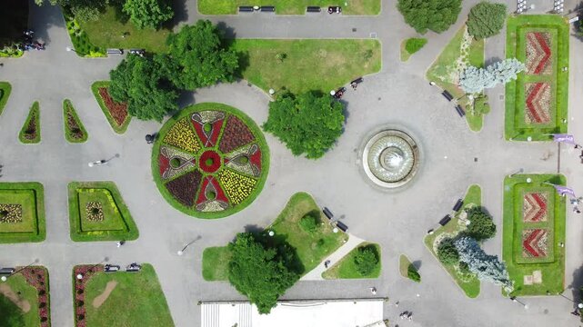 Top view of park located in center of Vrnjacka Banja, a spa-town in central Serbia. Drone video, aerial perspective.
