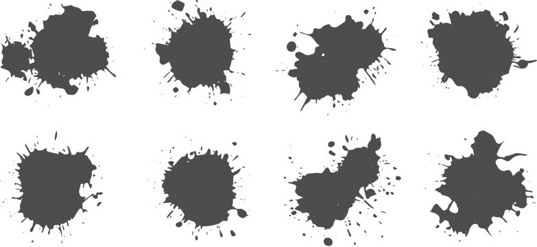 Eight dark grey ink splatters on white background paint splatter