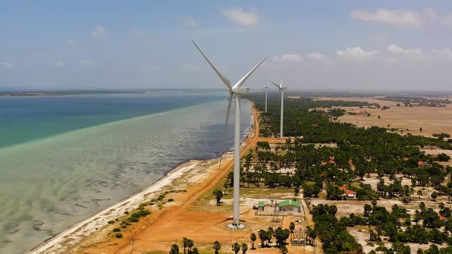 Wind turbines on the coastline. Wind power plant. Jaffna, Sri Lanka.