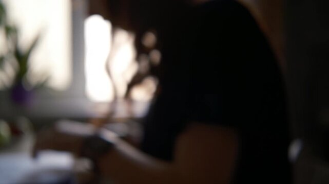 Cinematic teenage girl doing homework at her desk near a window in a cozy home interior. Soft natural daylight illuminates her face, notebooks, and study materials