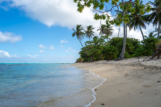 Anini Marae Beach on Huahine, French Polynesia, with turquoise waters