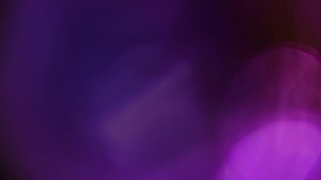 Light leak and bokeh overlay with vibrant purple and magenta tones, creating a dreamy, ethereal effect. This is a perfect asset for adding mood and style to edits.