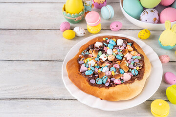 Obraz premium Sweet Easter chocolate eggs pizza