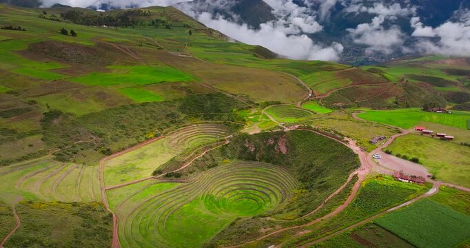 Inca ruins with circular agricultural terraces in the sacred valley of Peru. Aerial drone