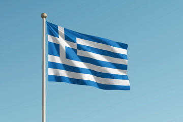 Obraz premium Greece national flag waving on pole against clear blue sky background.