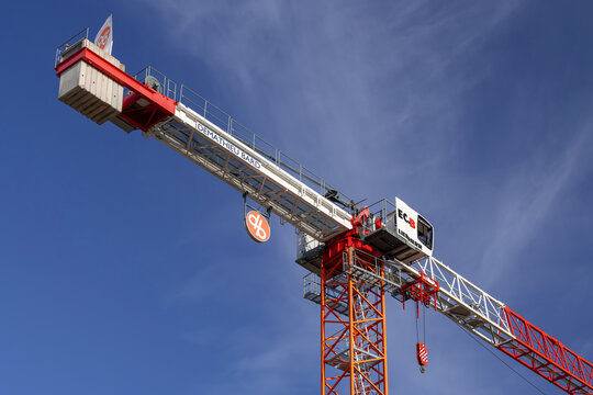 Nancy, France - January 7th 2026 : View on a flat-top tower crane Liebherr 250 EC-B 12 Litronic on a construction site for the construction of a building.