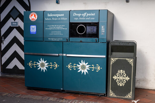 Kaatsheuvel, Netherlands - February 14, 2026: Recycling drop-off point for cups, bottles and cans at Efteling theme park. Sustainable waste collection system for visitors inside the amusement park.