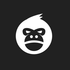 Obraz premium Minimalist White Monkey or Ape Head Logo with Fierce Expression on Dark Background