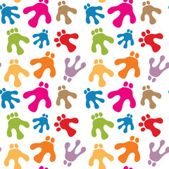 Colorful alien paw prints and animal track pattern with vibrant pink green blue and orange silhouettes for kids playful design themes