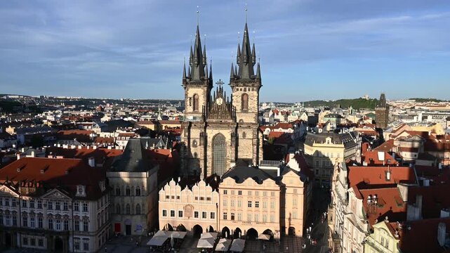  City Center Life and Architecture in Prague, Czech Republic. The footage captures iconic landmarks, red trams, and and the beautiful Gothic and Baroque architecture of the old town