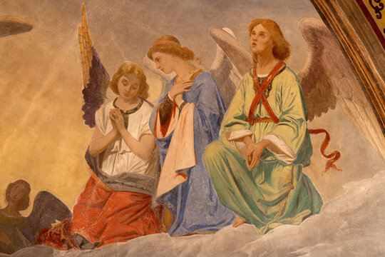 BUSTO ARSIZIO, ITALY - JANUARY 19, 2026: The fresco of angels at prayer in the church Santuario di Santa Maria di Piazza by unknow artist from end of 19. cent.